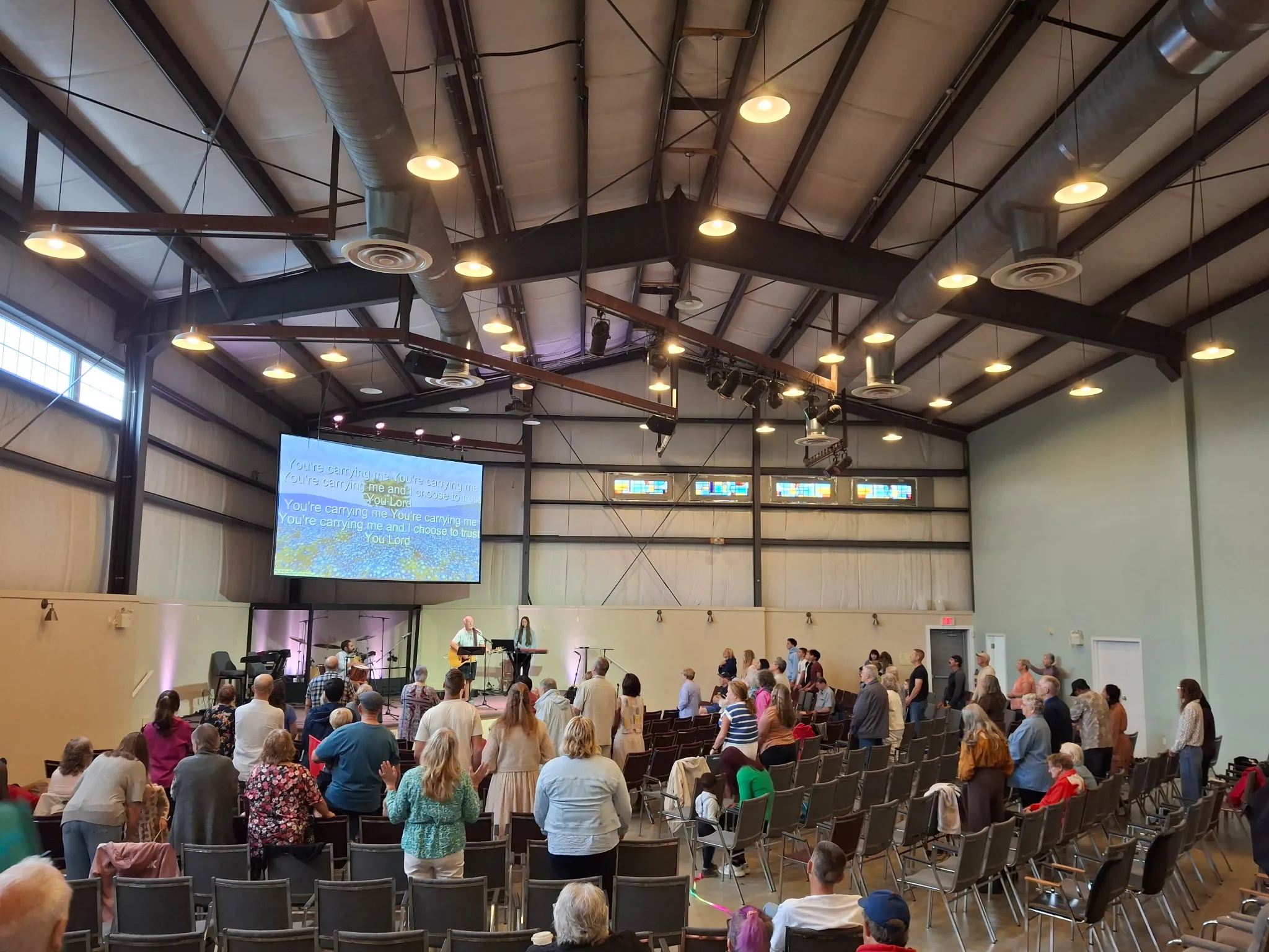 The Vineyard Church Halifax congregation worshipping together on a Sunday morning